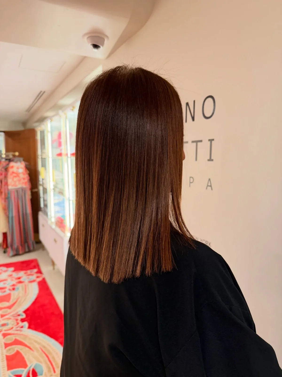 Straight auburn hair photographed from a three-quarter angle